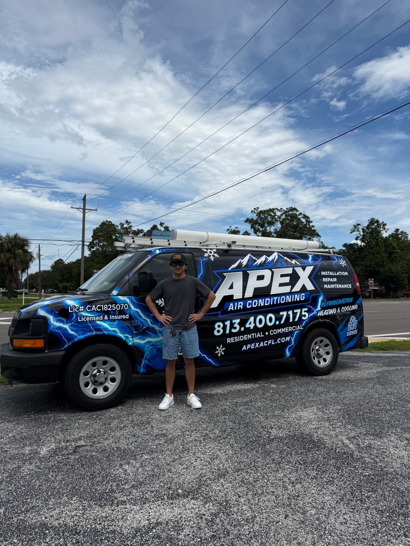 Apex Air Conditioning branded service van and team member